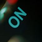 Schriftzug on vor dunklem Hintergrund