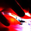 Neue Medien, leuchtende Maus