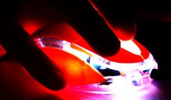 Neue Medien, leuchtende Maus